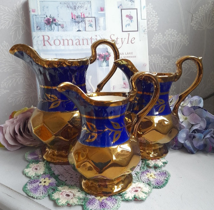 Antique Set of 3 WADE Graduating Jugs in Copper Lustreware & Blue