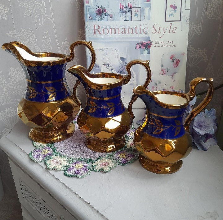 Antique Set of 3 WADE Graduating Jugs in Copper Lustreware & Blue