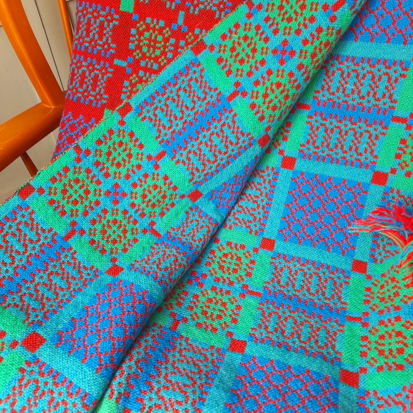Welsh Tapestry Blanket in Reds Blues & Greens by Melin Tregwynt