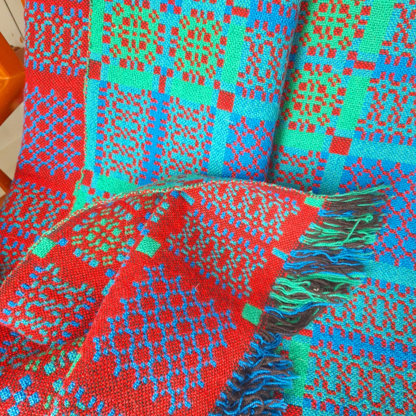 Welsh Tapestry Blanket in Reds Blues & Greens by Melin Tregwynt