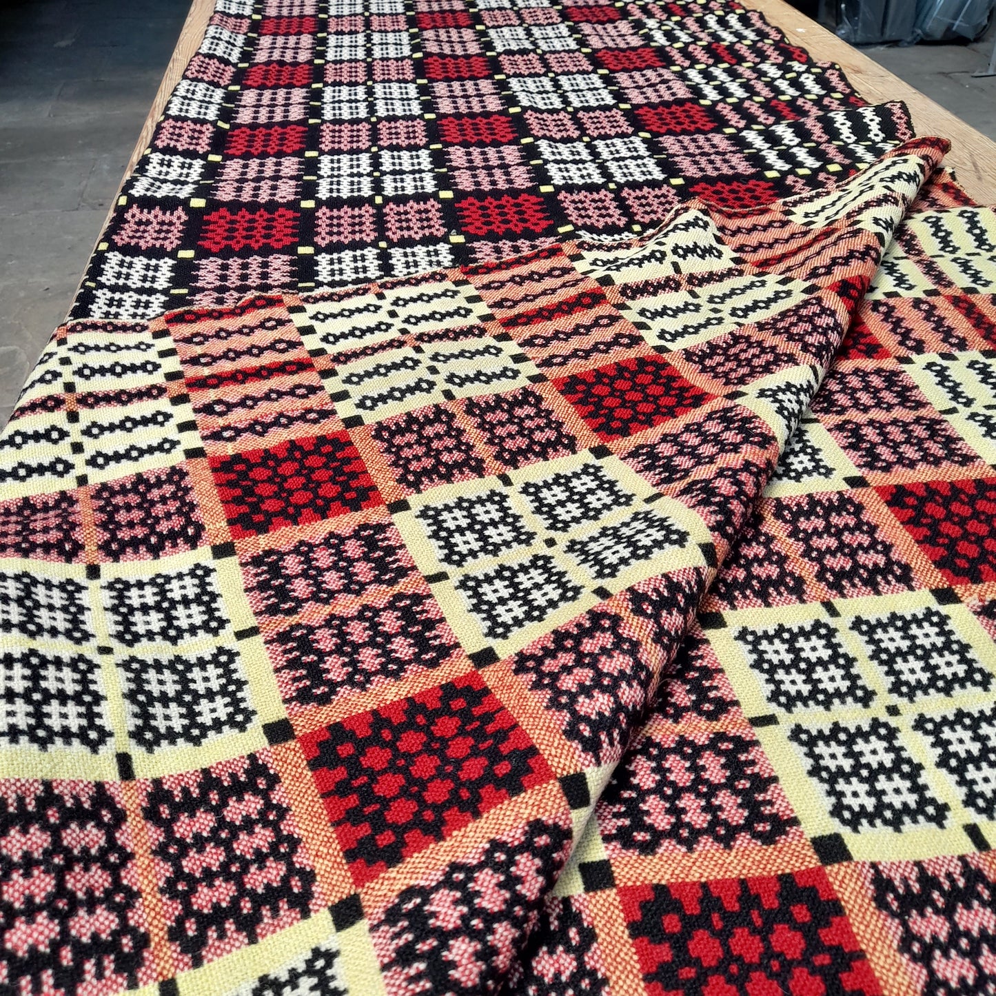 Welsh Tapestry Blanket in Black Red, Yellow & White by Gwili Mill
