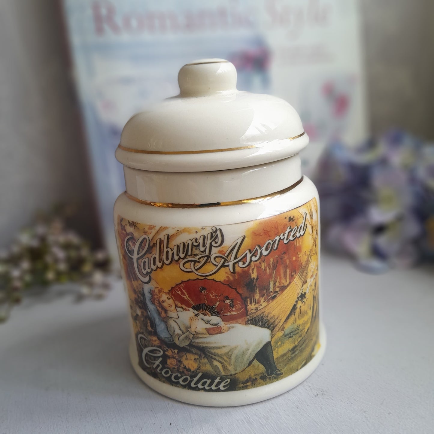 Vintage Cadbury chocolate advertising jar with lid