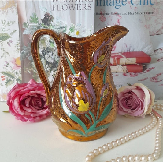 Antique copper lustreware jug with tulips