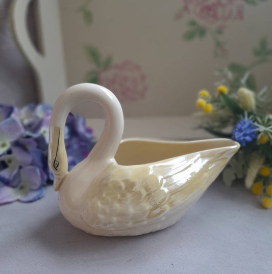 A Belleek Irish Porcelain Swan Vase in Pretty Pale Lemon Lustreware